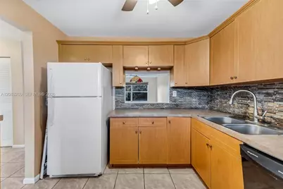 6570 Royal Palm Blvd #302J, Margate, FL 33063 - Photo 10