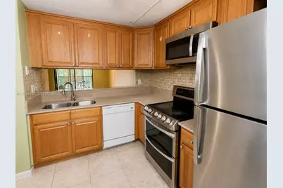3410 Foxcroft Rd #314, Miramar, FL 33025 - Photo 12