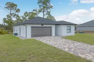 12 W 15th St, Lehigh Acres, FL 33972 - Photo 1