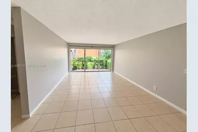 8821 Wiles Rd #102, Coral Springs, FL 33067 - Photo 1