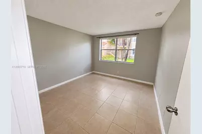 8821 Wiles Rd #102, Coral Springs, FL 33067 - Photo 6