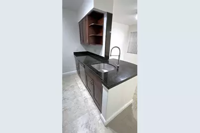 2841 N Oakland Forest Dr #203, Oakland Park, FL 33309 - Photo 10