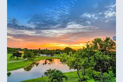 3980 Oaks Clubhouse Dr #409, Pompano Beach, FL 33069 - Photo 1