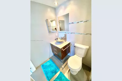 400 Golden Isles Dr #9, Hallandale Beach, FL 33009 - Photo 18