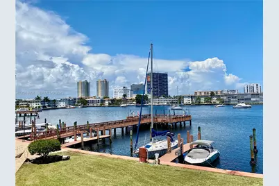 400 Golden Isles Dr #9, Hallandale Beach, FL 33009 - Photo 1