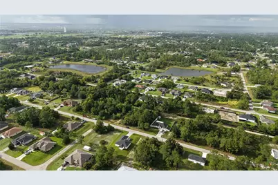 739 Theodore Vail St E, Lehigh Acres, FL 33974 - Photo 18