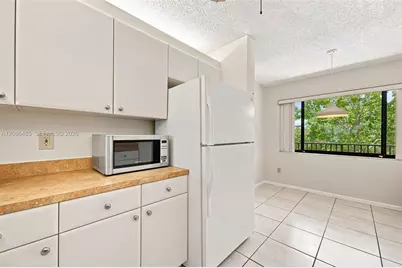 10668 W Clairmont Cir #303, Tamarac, FL 33321 - Photo 20