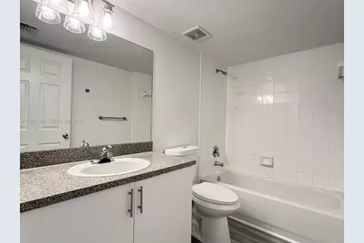 5045 Wiles Rd #303, Coconut Creek, FL 33073 - Photo 12