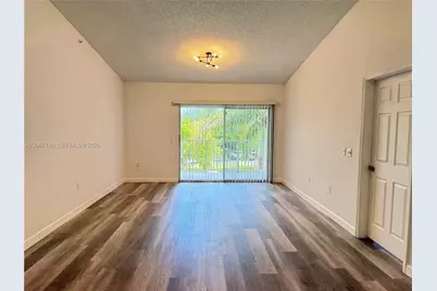 5045 Wiles Rd #303, Coconut Creek, FL 33073 - Photo 4