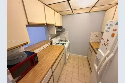1255 W 53rd St #309, Hialeah, FL 33012 - Photo 12