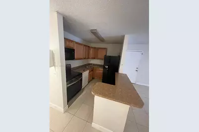 10773 Cleary Blvd #103, Plantation, FL 33324 - Photo 1