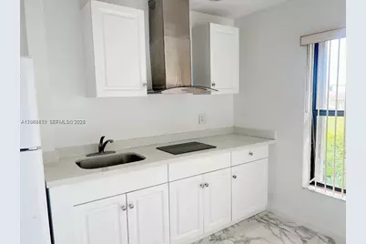 1440 NW 45th St #A1, Deerfield Beach, FL 33064 - Photo 1