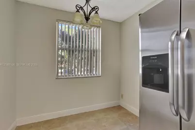 8891 Wiles Rd #102, Coral Springs, FL 33067 - Photo 16