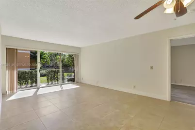 8891 Wiles Rd #102, Coral Springs, FL 33067 - Photo 6