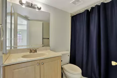 8891 Wiles Rd #102, Coral Springs, FL 33067 - Photo 18