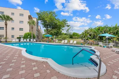 1040 Country Club Dr #208, Margate, FL 33063 - Photo 2