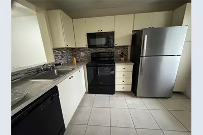 7760 NW 50th St #107, Lauderhill, FL 33351 - Photo 1