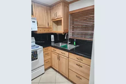 1725 W 60th St #F202, Hialeah, FL 33012 - Photo 1