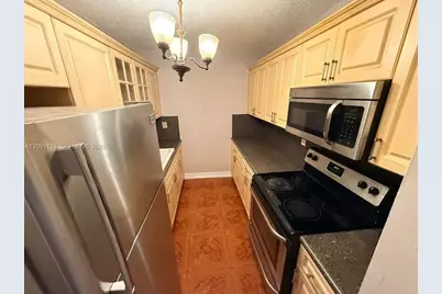 6091 W 22nd Ct #407, Hialeah, FL 33016 - Photo 16