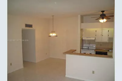 9940 S Belfort Cir #203, Tamarac, FL 33321 - Photo 1