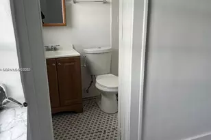 1053 NW 30th St, Miami, FL 33127 - Photo 8