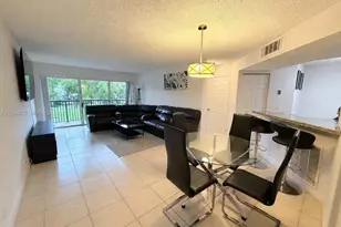 8741 Wiles Rd, Coral Springs, FL 33067 - Photo 1