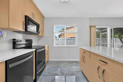 1248 NW 125th Ter, Sunrise, FL 33323 - Photo 18