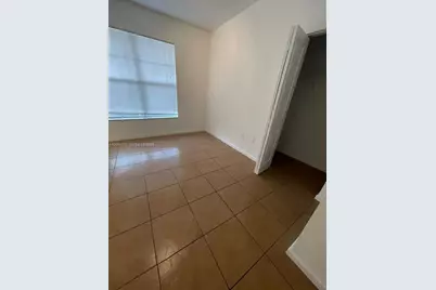 5840 W Sample Rd #105, Coral Springs, FL 33067 - Photo 2