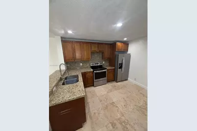 10125 W Sunrise Blvd #303, Plantation, FL 33322 - Photo 16