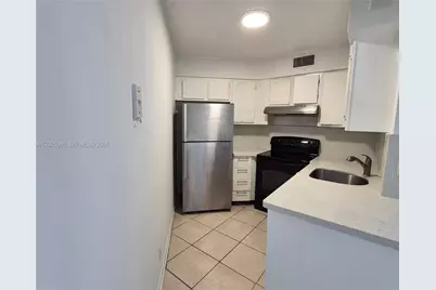 210 Lake Pointe Dr #210, Oakland Park, FL 33309 - Photo 2