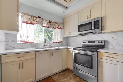 4047 NW 16th St #107, Lauderhill, FL 33313 - Photo 6
