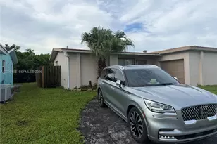 8410 NW 24th Pl, Sunrise, FL 33322 - Photo 1