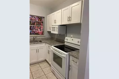 140 Royal Palm Rd #207, Hialeah Gardens, FL 33016 - Photo 1