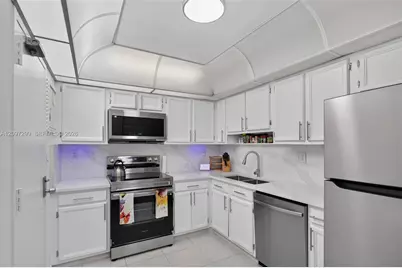 10777 W Sample Rd #718, Coral Springs, FL 33065 - Photo 6