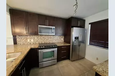 320 Racquet Club Rd #104, Weston, FL 33326 - Photo 1