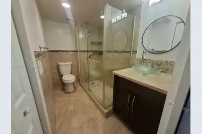 320 Racquet Club Rd #104, Weston, FL 33326 - Photo 24