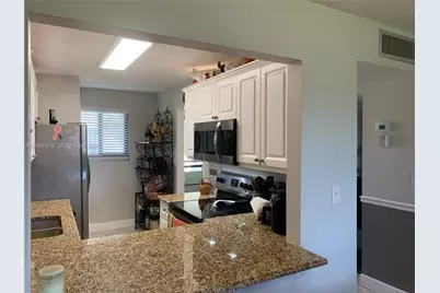 5463 SE Miles Grant Rd #210, Stuart, FL 34997 - Photo 6