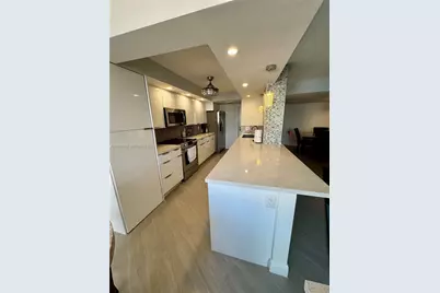 100 Golden Isles Dr #205, Hallandale Beach, FL 33009 - Photo 1