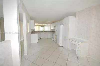 7807 Granville Dr #104, Tamarac, FL 33321 - Photo 4