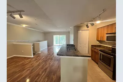 5940 W Sample Rd #304, Coral Springs, FL 33067 - Photo 8