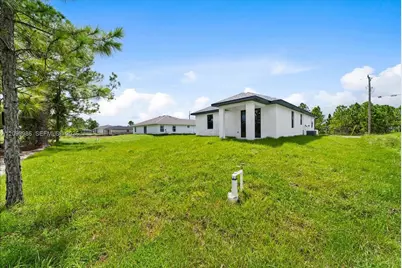 1025 Marshall Ave S, Lehigh Acres, FL 33976 - Photo 30