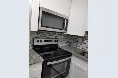 2990 NE 16th Ave #105, Oakland Park, FL 33334 - Photo 1
