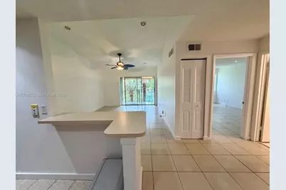 10765 Cleary Blvd #306, Plantation, FL 33324 - Photo 1