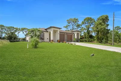 4869 28th St SW, Lehigh Acres, FL 33973 - Photo 2