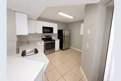 8821 Wiles Rd #102, Coral Springs, FL 33067 - Photo 2