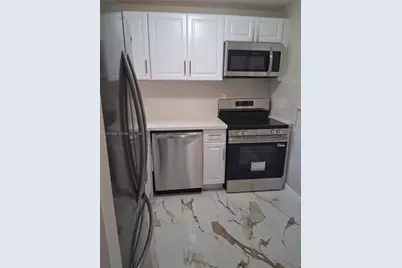 9750 Sunrise Lakes Blvd #106, Sunrise, FL 33322 - Photo 1