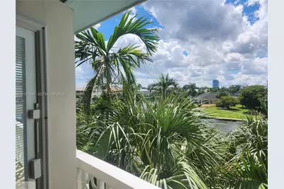 455 Golden Isles Dr #305, Hallandale Beach, FL 33009 - Photo 1