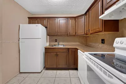6195 Rock Island Rd #104, Tamarac, FL 33319 - Photo 6