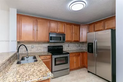 5741 Riverside Dr #205A5, Coral Springs, FL 33067 - Photo 2