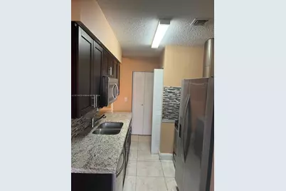 18336 NW 68th Ave #J, Hialeah, FL 33015 - Photo 1